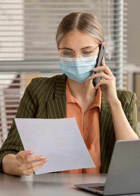 Employee wearing face mask at the office