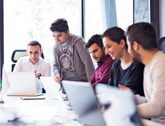 Employees in a meeting room in the office