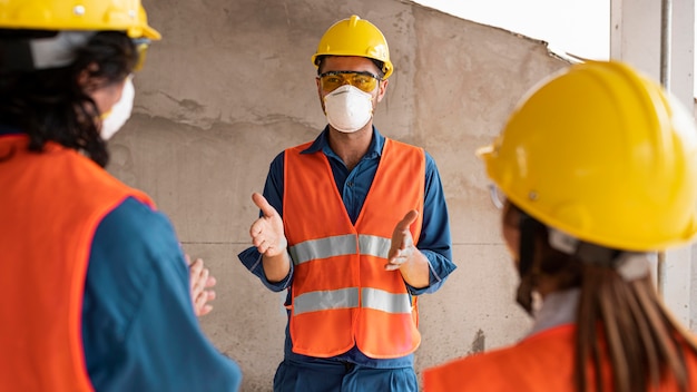 Employees with safety equipment