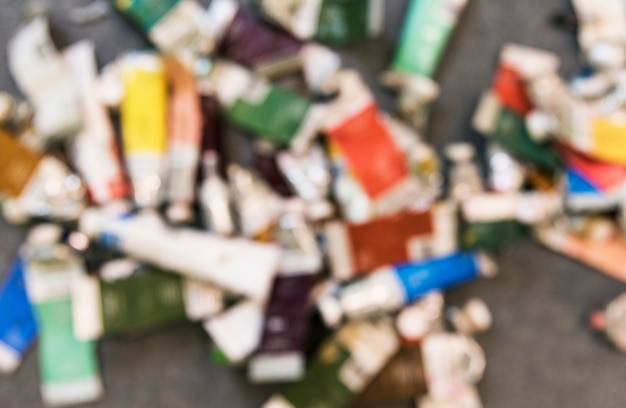 Free photo empty acryllic paint tubes in an art studio