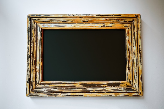Empty black sign in a pretty frame