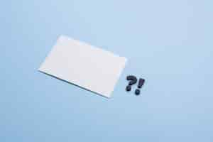 Free photo empty business card and punctuation marks