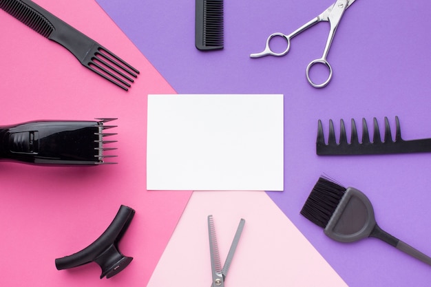 Empty card surrounded by hair tools