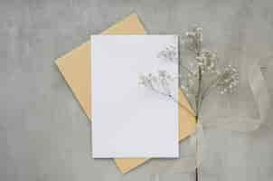 Free photo empty card with flower top view