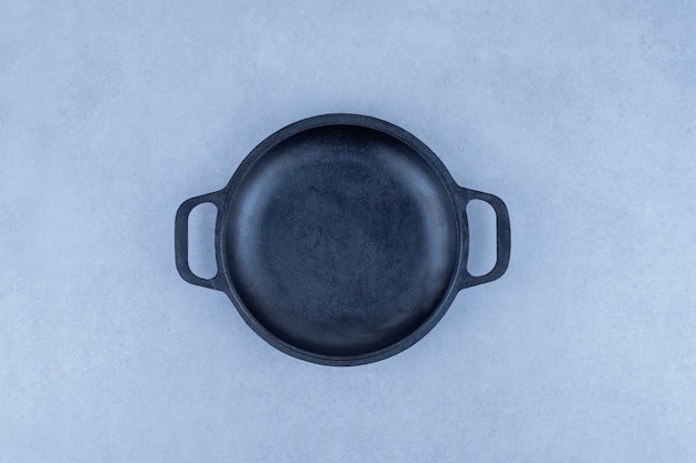 Empty dark pan.