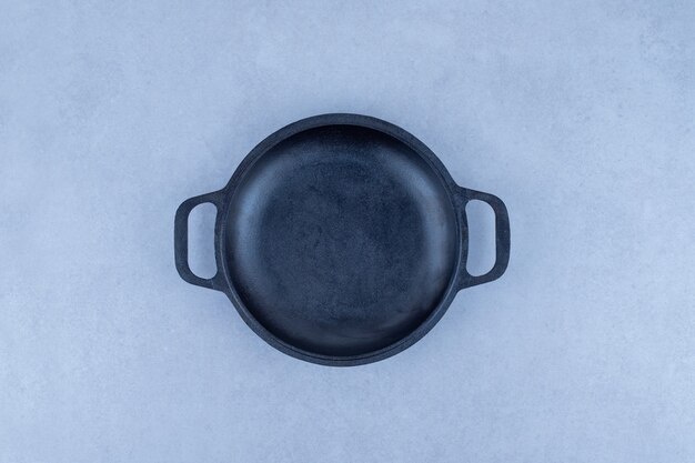 Empty dark pan.