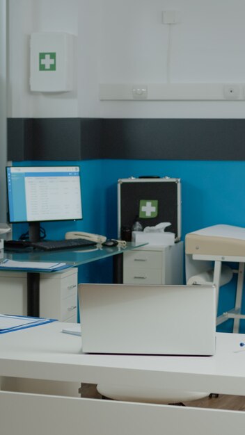 Empty doctors office with medical instruments at facility