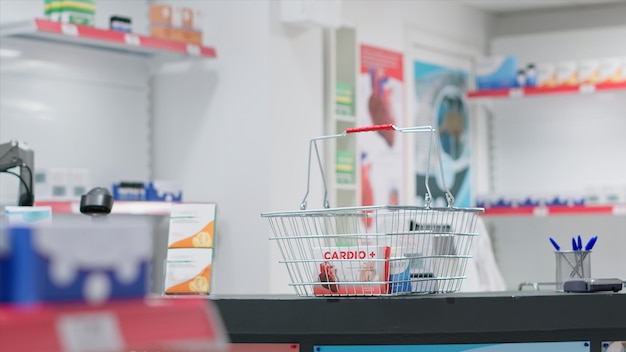 Empty drugstore cash register with boxes of pills or vitamins