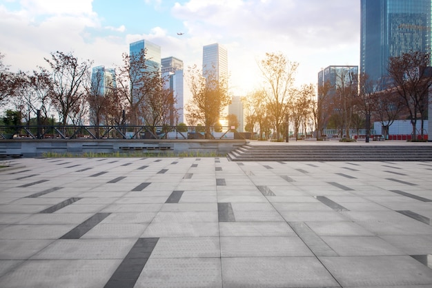 Empty floor with modern skyline and buildings