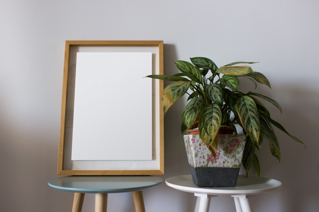 Free photo empty frame with decoration plants