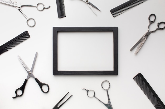 Free photo empty frame with hair tools