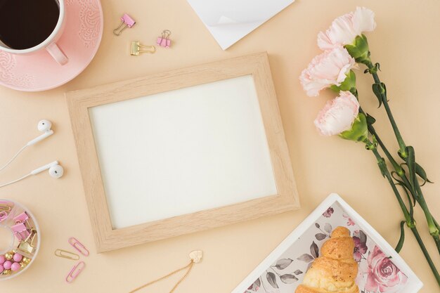 Empty frame with lovely flowers