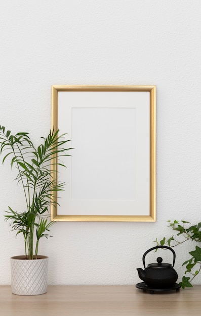 Empty golden frame on wall