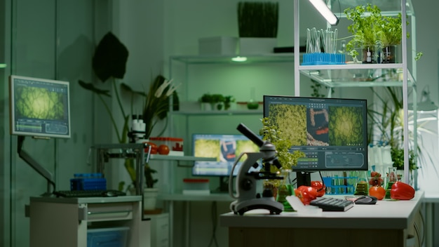 Empty laboratory with nobody in it prepared for genetic test using professional microscope