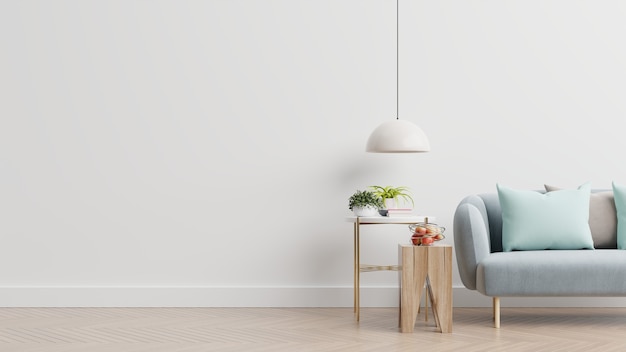 Empty living room with blue sofa, plants and table on empty white wall background. 3d rendering