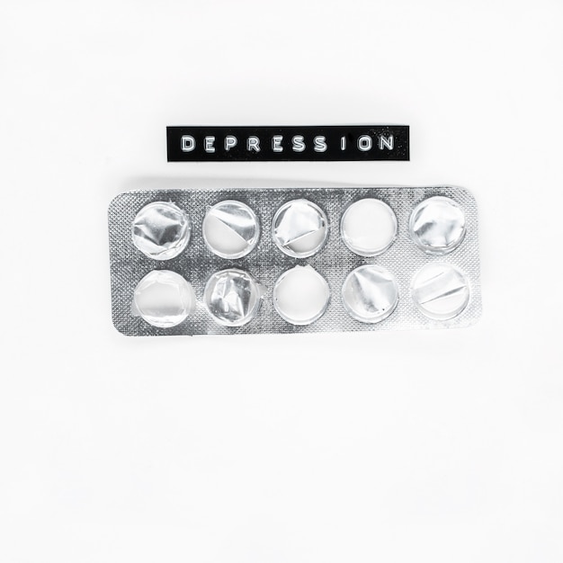 Empty medicine blister with depression label isolated over white background