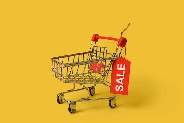 Empty mini shopping cart for online shopping. Premium Photo