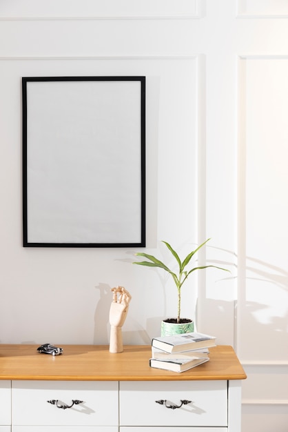 Free photo empty photo frame on wall interior design