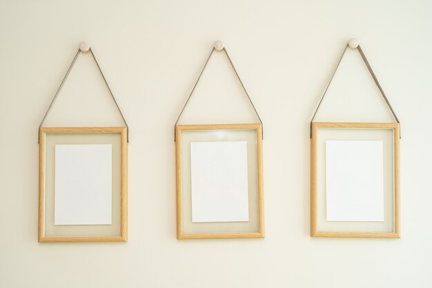 Empty photo frames on wall