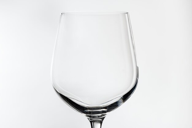 Empty red wine glass isolated