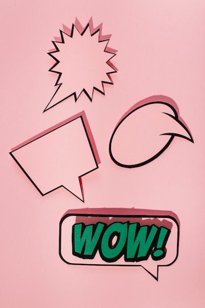 Empty speech bubble with wow sound expression bubble on pink background