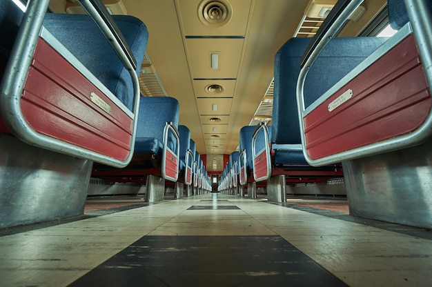 Empty train seats shot from the floor