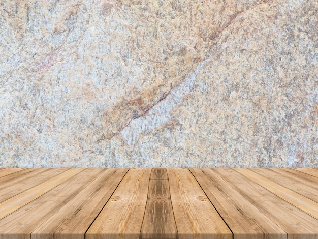 Free photo empty tropical wood table top with dark stone wall