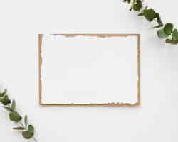 Free photo empty wedding invitation with plants