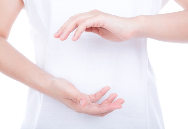 Empty woman hands over body isolated on background.