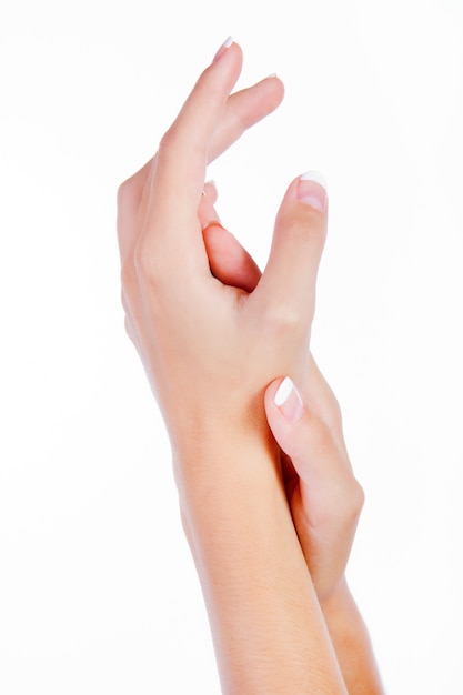 Empty woman hands isolated on white background