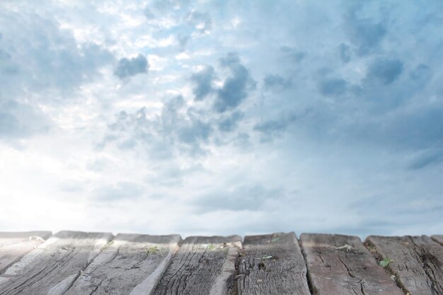 Empty wood table top and blur sky