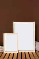 Free photo empty wooden frames arrangement