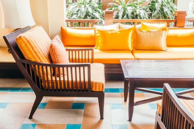 Empty wooden sofa and chair