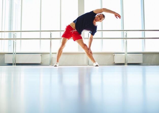 Energetic man in the gym