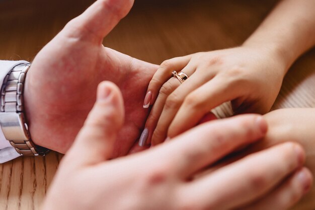 Engagement ring with a stone on the gentle bride's hand