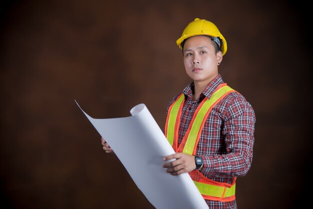 Engineer man, construction worker concept,blue print