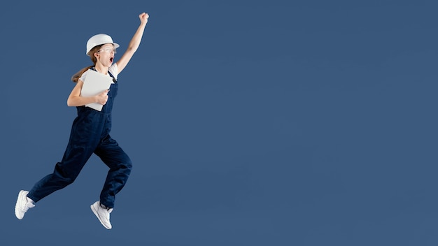 Free photo engineer woman jumping