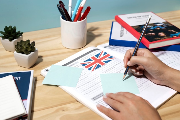 English book resting on the table of working space