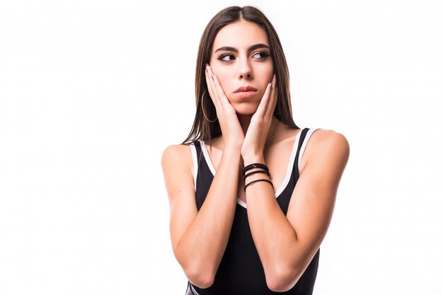 Enigmatic brunette model in black shirt isolated