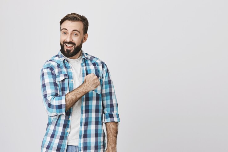 Free Photo enthusiastic adult bearded man fist pump, boost confidence