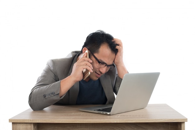 entrepreneur indoors desk laptop pressure