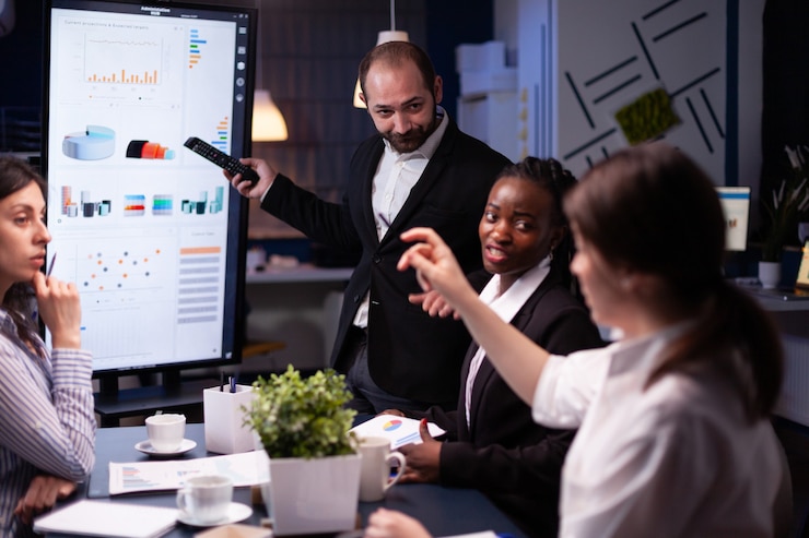 Free Photo entrepreneur man brainstorming management strategy working hard in meeting office room late at night