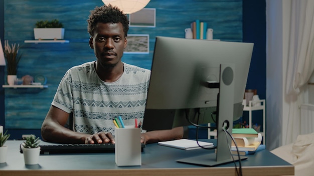 Entrepreneur typing on keyboard and working from home. person using computer for remote corporate work and browsing internet. businessman doing networking project with technology