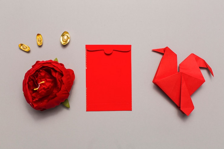 Free Photo envelope between flower head and origami bird
