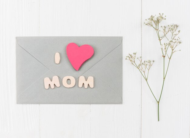 Envelope for Mother`s day with branch gypsophila