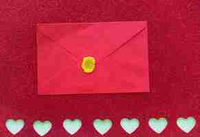 Free photo envelope on paper with cut hearts