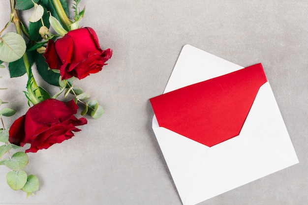 Envelope with paper and flowers
