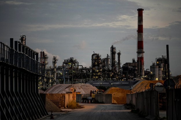 Environmental pollution and factory exterior at night