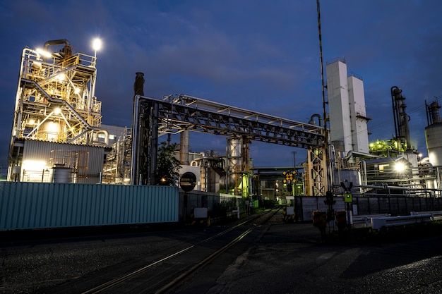 Environmental pollution and factory exterior at night