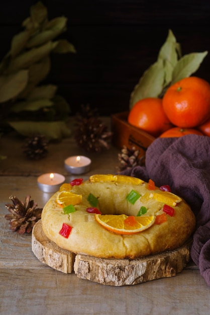 Epiphany day dessert with tealights and oranges